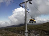 heading over to its new home on the ski area, replescent in 'Naki colours!